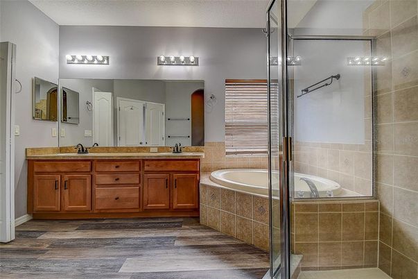 Bathroom, Dual Sink Vanities, Glass Shower, Interior, Wood Texture Flooring
