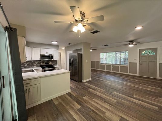 Interior, Kitchen, Recessed Lighting, Stainless Steel Appliances, Wood Texture Flooring