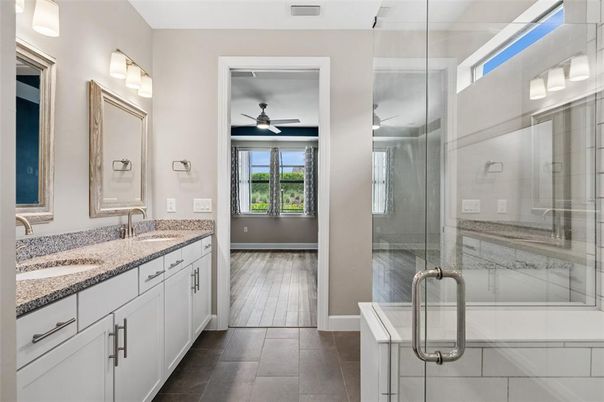 Bathroom, Dual Sink Vanities, Glass Shower, Interior, Wood Texture Flooring