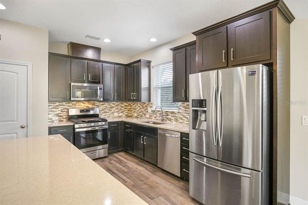 Interior, Kitchen, Recessed Lighting, Stainless Steel Appliances, Wood Texture Flooring