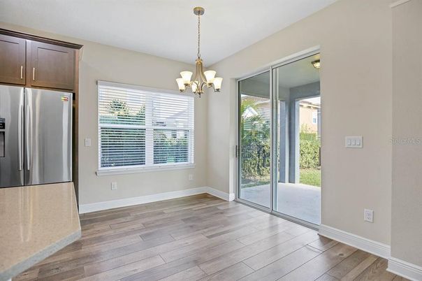 Chandelier, Empty room, Interior, Stainless Steel Appliances, Wood Texture Flooring