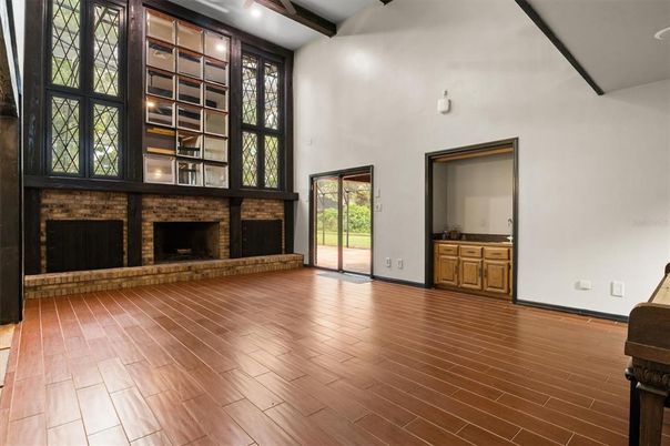 Empty room, Fireplace, Interior, Recessed Lighting, Wooden Beams, Wood Texture Flooring