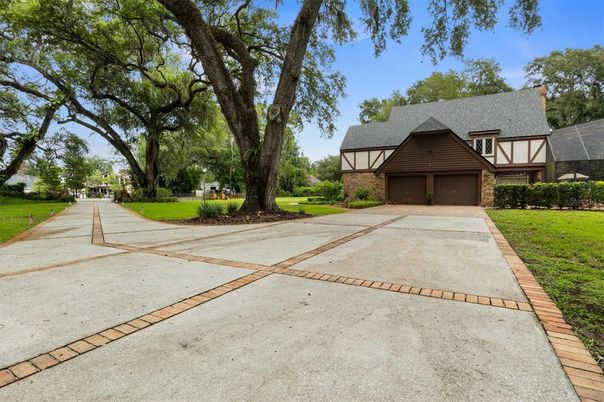 Attached, Backyard, Exterior, Facade, Tudor Revival