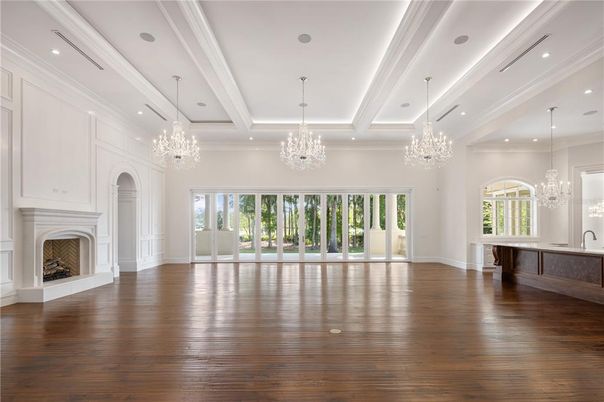 Chandelier, Empty room, Fireplace, Interior, Recessed Lighting, Wood Texture Flooring