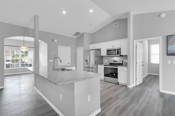 Interior, Kitchen, Pendant Lights, Recessed Lighting, Stainless Steel Appliances, Wood Texture Flooring
