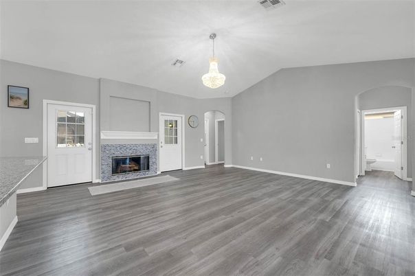 Chandelier, Empty room, Fireplace, Interior, Pendant Lights, Wood Texture Flooring