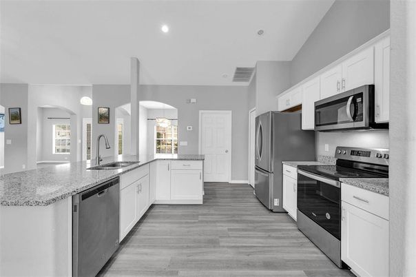 Interior, Kitchen, Pendant Lights, Recessed Lighting, Stainless Steel Appliances, Wood Texture Flooring
