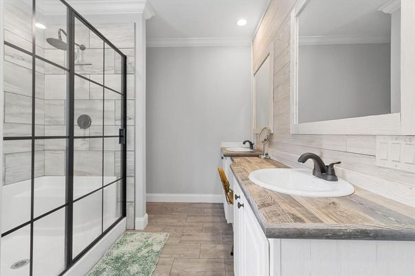 Bathroom, Dual Sink Vanities, Glass Shower, Interior, Recessed Lighting, Wood Texture Flooring