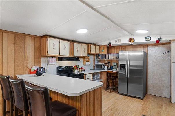 Interior, Kitchen, Recessed Lighting, Wood Texture Flooring, Wooden Walls
