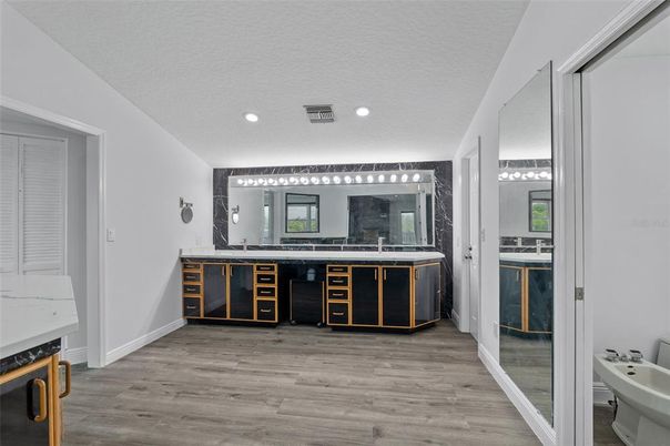 Bathroom, Dual Sink Vanities, Interior, Recessed Lighting, Wood Texture Flooring
