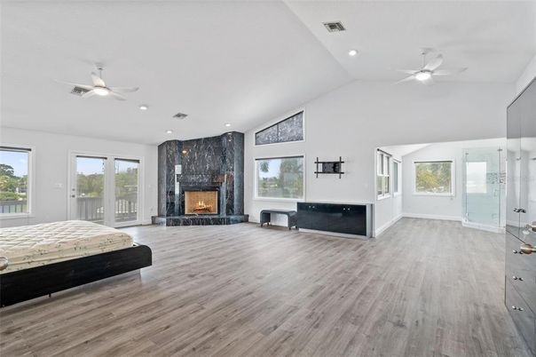 Bedroom, Fireplace, Interior, Recessed Lighting, Wood Texture Flooring