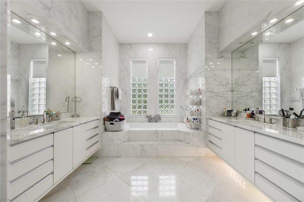 Bathroom, Dual Sink Vanities, Glass Shower, Interior, Marble, Marble Walls, Recessed Lighting