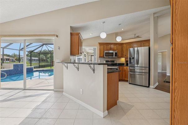Glass Ceilings, Interior, Kitchen, Pendant Lights, Pool, Recessed Lighting, Stainless Steel Appliances
