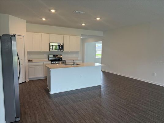 Interior, Kitchen, Recessed Lighting, Stainless Steel Appliances, Wood Texture Flooring
