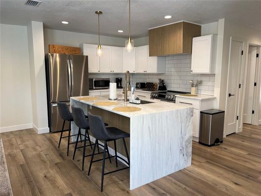 Interior, Kitchen, Pendant Lights, Recessed Lighting, Stainless Steel Appliances, Wood Texture Flooring