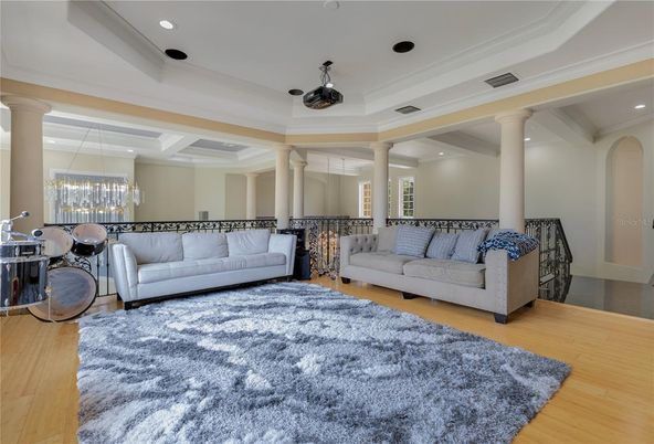 Chandelier, Dining room, Fireplace, Interior, Living room, Recessed Lighting, Wood Texture Flooring