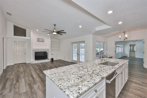 Fireplace, Interior, Kitchen, Recessed Lighting, Wood Texture Flooring