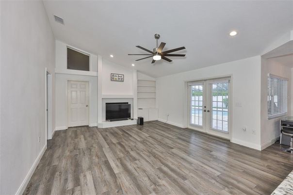 Empty room, Fireplace, Interior, Recessed Lighting, Wood Texture Flooring