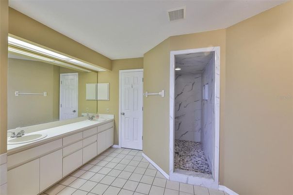 Bathroom, Dual Sink Vanities, Interior, Marble Walls, Recessed Lighting
