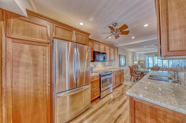 Dining room, Interior, Kitchen, Recessed Lighting, Stainless Steel Appliances, Wood Texture Flooring