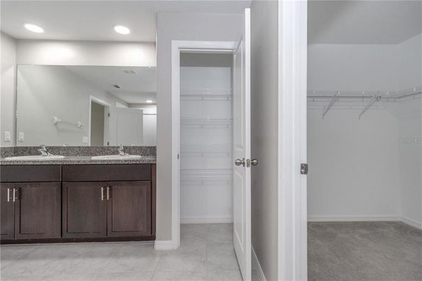 Bathroom, Dual Sink Vanities, Interior, Recessed Lighting, Walk-in Closets