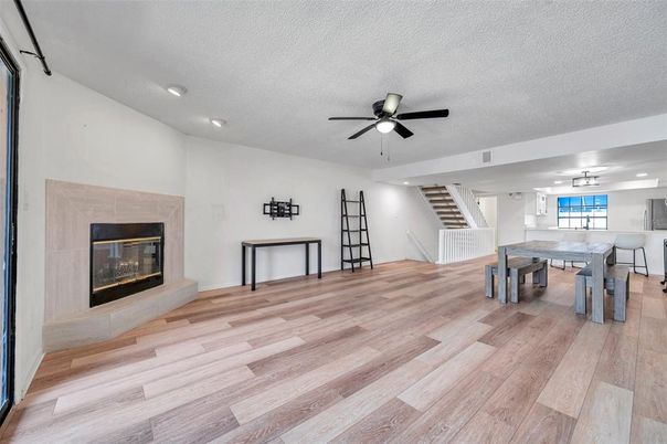Dining room, Fireplace, Interior, Recessed Lighting, Wood Texture Flooring