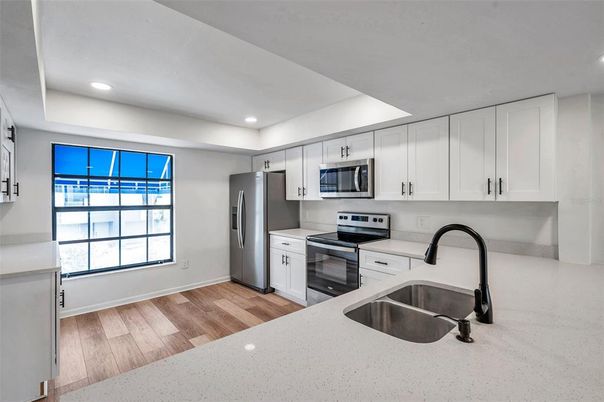 Interior, Kitchen, Recessed Lighting, Stainless Steel Appliances, Wood Texture Flooring