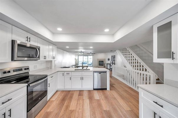 Interior, Kitchen, Recessed Lighting, Stainless Steel Appliances, Wood Texture Flooring