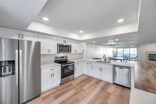 Interior, Kitchen, Pendant Lights, Recessed Lighting, Stainless Steel Appliances, Wood Texture Flooring