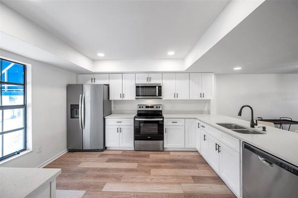 Interior, Kitchen, Recessed Lighting, Stainless Steel Appliances, Wood Texture Flooring