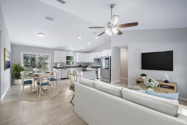 Dining room, Interior, Kitchen, Living room, Recessed Lighting, Stainless Steel Appliances, Wood Texture Flooring