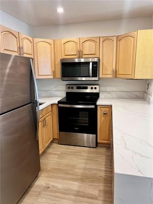 Interior, Kitchen, Marble Walls, Recessed Lighting, Wood Texture Flooring