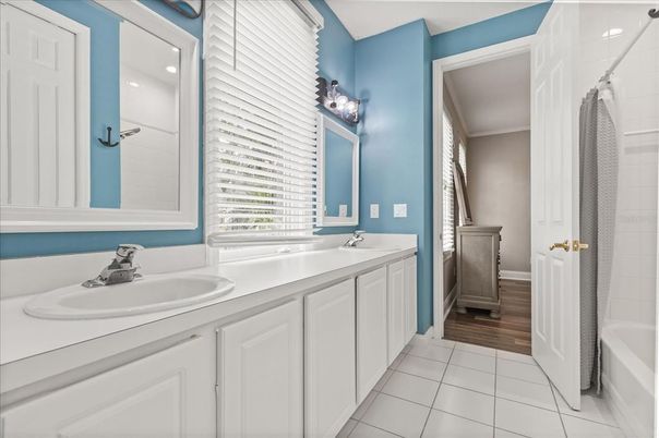 Bathroom, Dual Sink Vanities, Interior, Recessed Lighting, Wood Texture Flooring