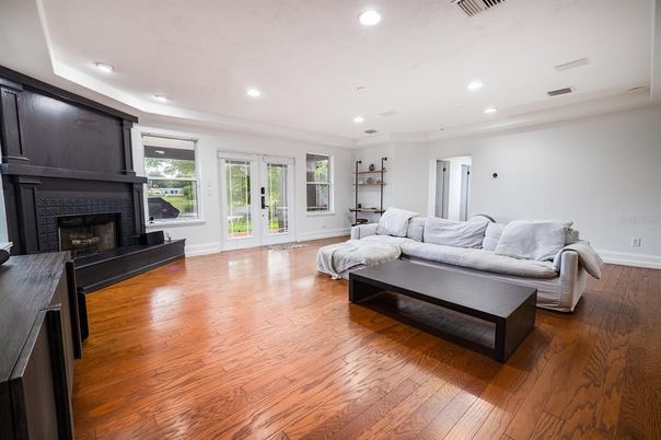 Fireplace, Interior, Living room, Recessed Lighting, Wood Texture Flooring