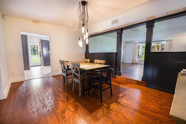 Dining room, Fireplace, Interior, Pendant Lights, Wood Texture Flooring