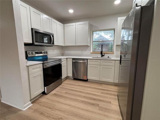 Interior, Kitchen, Recessed Lighting, Stainless Steel Appliances, Wood Texture Flooring