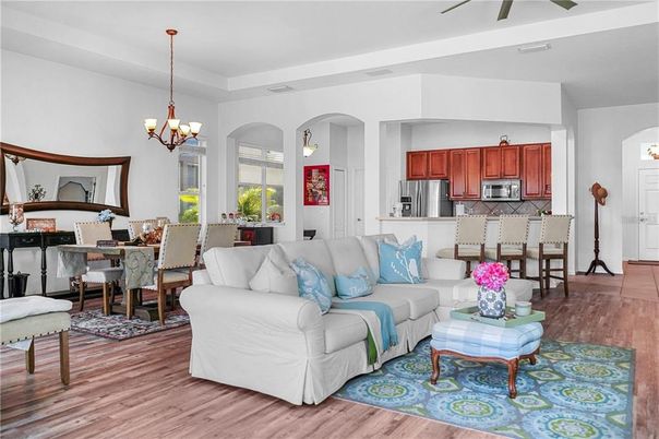 Chandelier, Dining room, Interior, Kitchen, Living room, Stainless Steel Appliances, Wood Texture Flooring