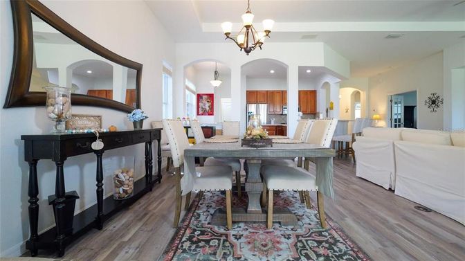 Chandelier, Dining room, Interior, Kitchen, Living room, Recessed Lighting, Wood Texture Flooring