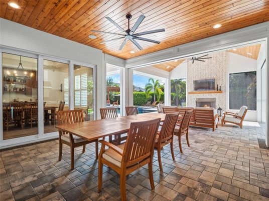 Dining room, Fireplace, Interior, Recessed Lighting, Stone Walls, Wooden Ceilings