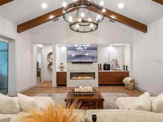 Chandelier, Fireplace, Interior, Living room, Recessed Lighting, Wooden Beams, Wood Texture Flooring