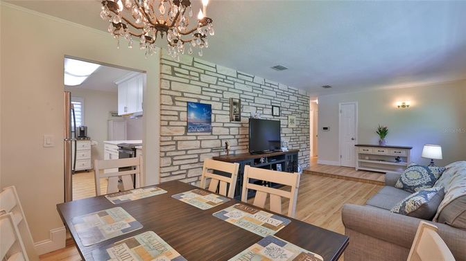 Chandelier, Dining room, Interior, Living room, Stone Walls, Wood Texture Flooring