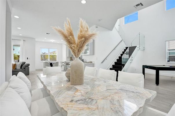 Dining room, Game Room, Interior, Living room, Recessed Lighting, Wood Texture Flooring