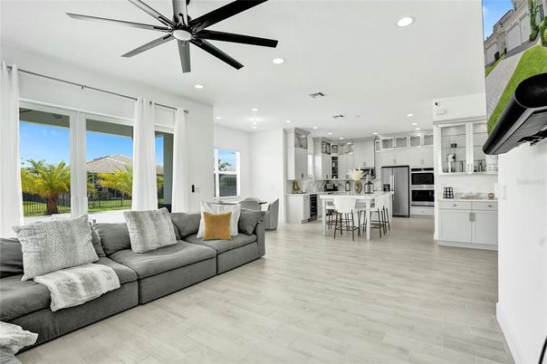 Dining room, Interior, Kitchen, Living room, Recessed Lighting, Stainless Steel Appliances, Wood Texture Flooring