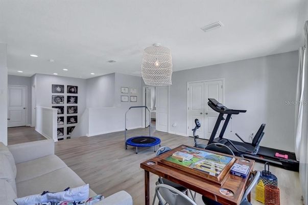 Chandelier, Fitness Equipment, Interior, Recessed Lighting, Wood Texture Flooring