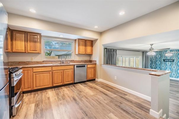 Interior, Kitchen, Pendant Lights, Recessed Lighting, Stainless Steel Appliances, Wood Texture Flooring