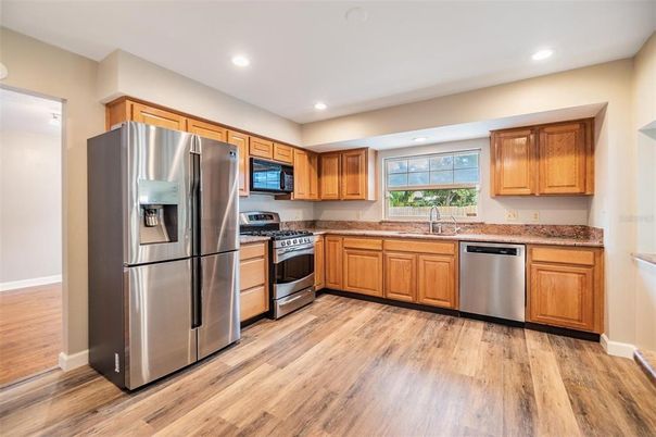 Interior, Kitchen, Recessed Lighting, Stainless Steel Appliances, Wood Texture Flooring
