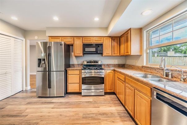 Interior, Kitchen, Recessed Lighting, Stainless Steel Appliances, Wood Texture Flooring