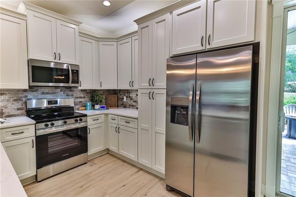 Interior, Kitchen, Recessed Lighting, Stainless Steel Appliances, Wood Texture Flooring
