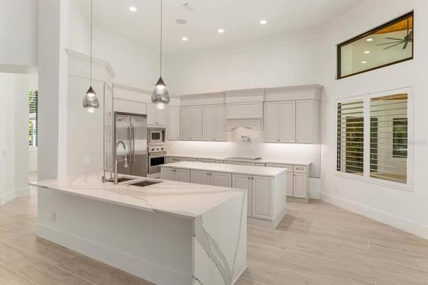 Interior, Kitchen, Pendant Lights, Recessed Lighting, Stainless Steel Appliances, Wood Texture Flooring