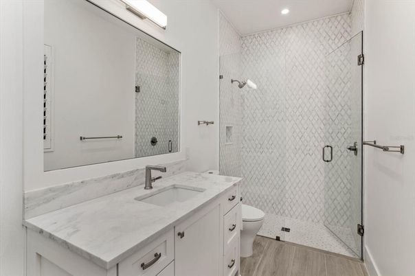 Bathroom, Glass Shower, Interior, Recessed Lighting, Wood Texture Flooring
